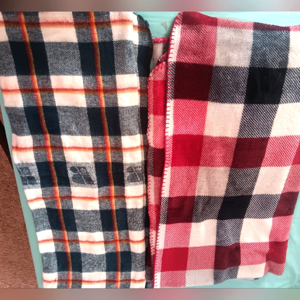 Two plaid throw blankets